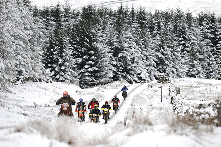 uk winter weather: Cross country motorcyclists