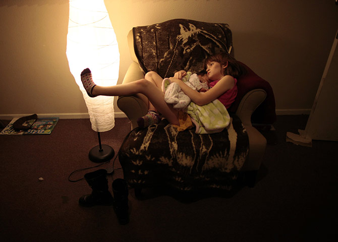 Hope Gardens : Lilly Earp hugs her five week old sister Emily