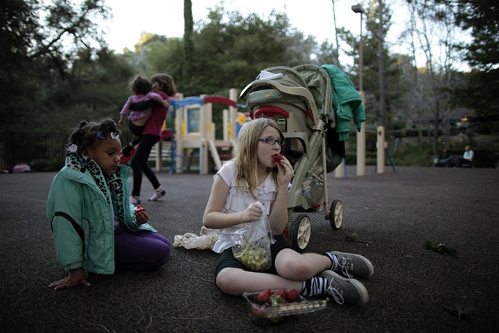 Hope Gardens : Lindzy Earp sits in the playground with Deja Mass