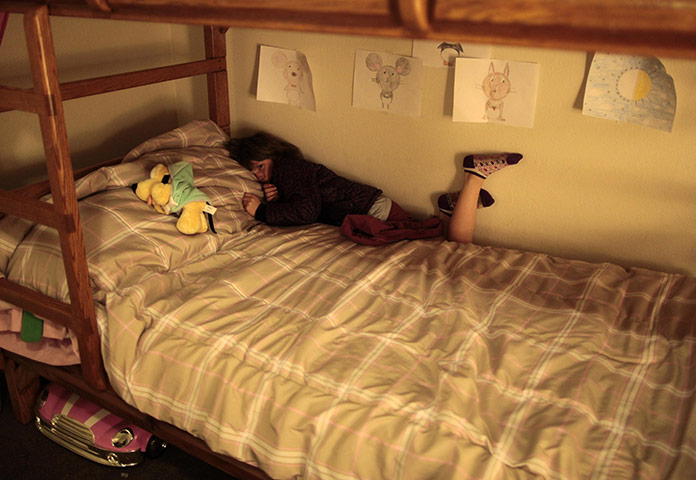 Hope Gardens : Lilly Earp lies on her bed at Hope Gardens Family Center in Los Angeles