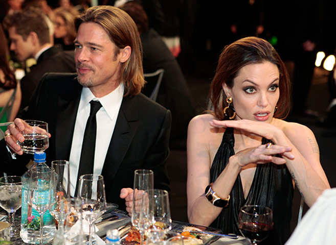 SAGS/DGA gallery:  Jolie and Swinton talk as actor Pitt looks on