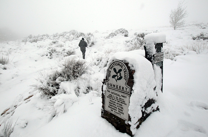 UK weather: A man takes a walk along a footpath on Dunkery Hill, near Minehead