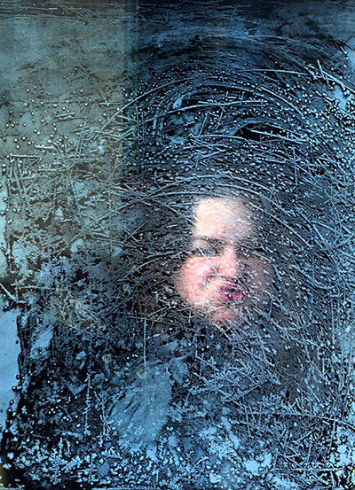 24 hours in pictures: A woman looks through an icy window on a tram in Sofia, Bulgaria