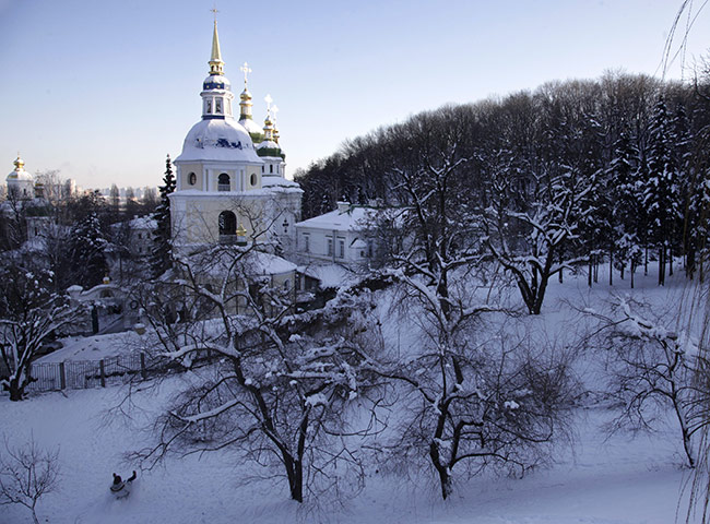 World weather: An Orthodox Christian cathedral in winter landscape in Kiev, Ukraine
