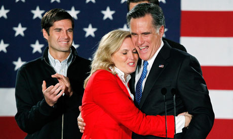 Republican presidential candidate Mitt Romney hugs his wife Ann