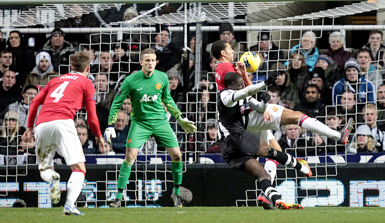 Wednesday Footie: Newcastle United's Demba Ba scores the first goal against Manchester United
