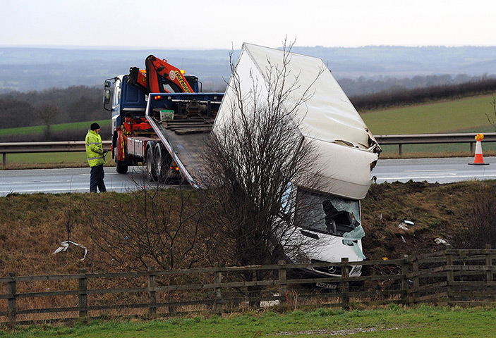 UK weather: A van is recovered from the side of the A1 near Boroughbridge, Yorkshire