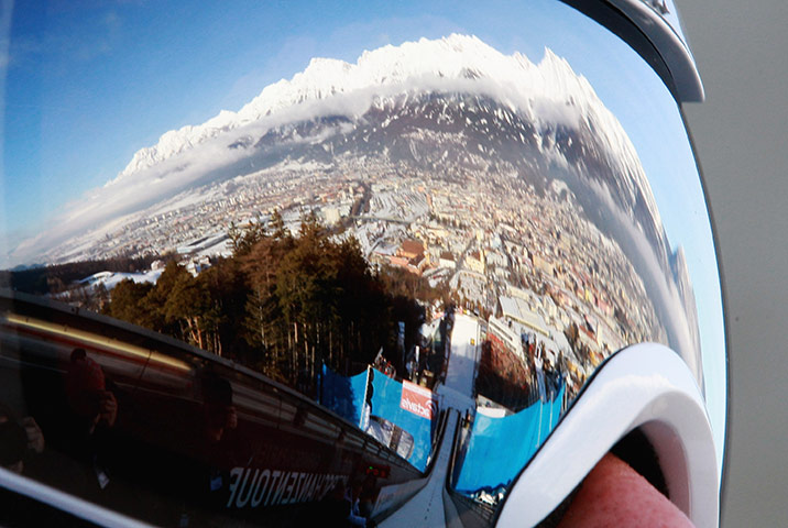 Best of the Week sport: A view of the Nordkette mountain reflected in the goggles of Anders Bardal