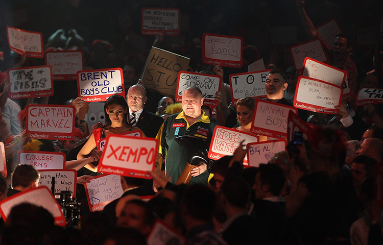 Best of the Week sport: Andy Hamilton enters the arena ahead of the World Darts Championships Final