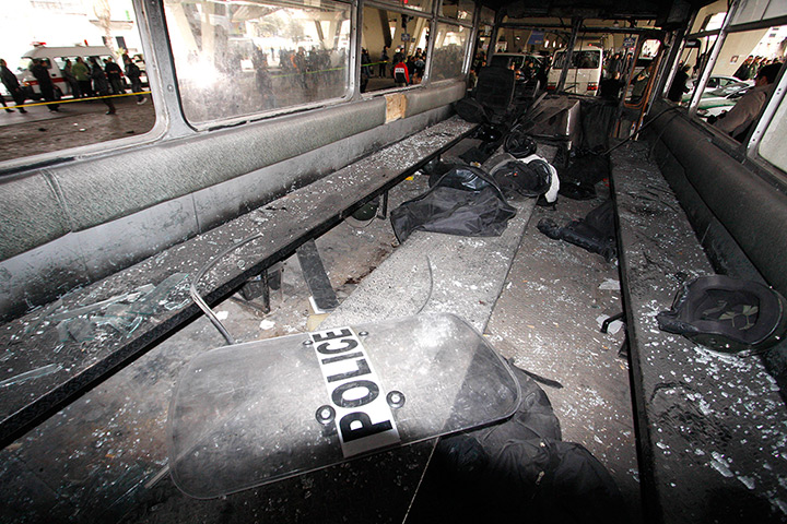 Explosion in Syria: Riot police equipment inside a damaged bus