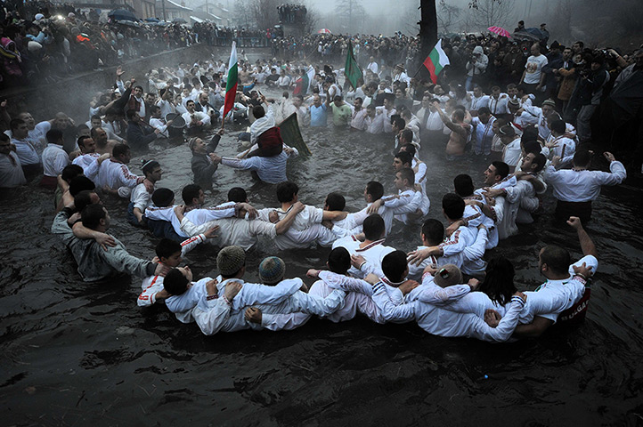 24 hours in pictures: Men perform the traditional Bulgarian 