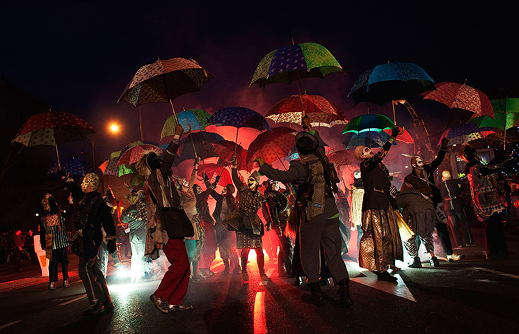 24 hours in pictures: Actors perform during the annual Epiphany parade in Madrid
