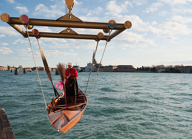 Epiphany: A participant's boat launched in the lagoon for the 34th  Befana Regatta