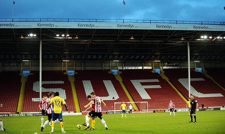 Magic of the Cup: A solitary fan in the Kop end as Sheffield United beat Salisbury City 3-1