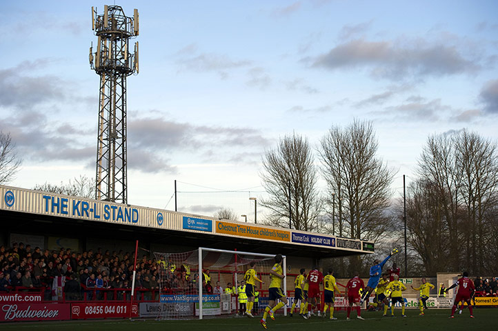 FA Cup Round-up: Bristol City keeper David James punches the ball clear against Crawley Town
