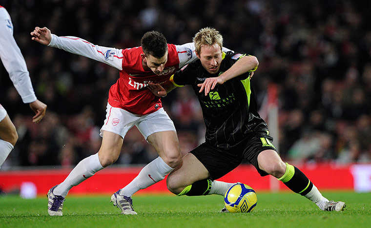 Arsenal v Leeds Utd: Koscielny and Becchio battle for the ball