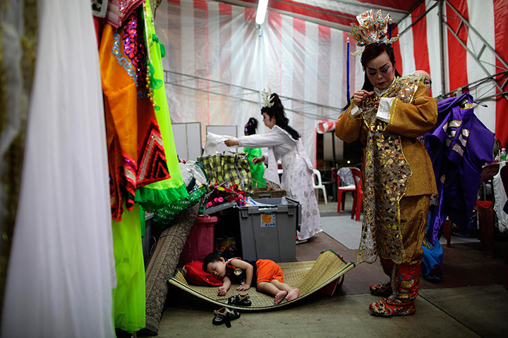 24 hours: Singapore: A child sleeps backstage