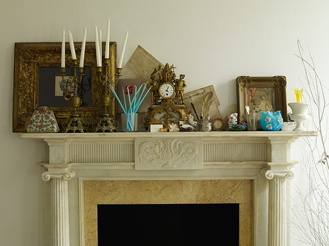 Homes: Russain House: Painting and other paraphernalia on a mantlepiece