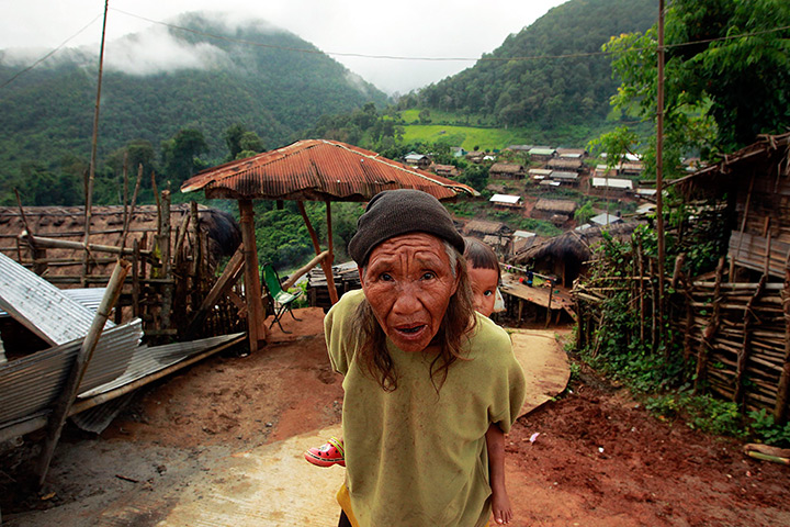 24 hours: Chiang Mai's Fang district, Thailand: Nanu carries her great-granddaughter 