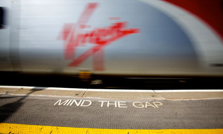 Virgin train in platfrom with mind the gap sign