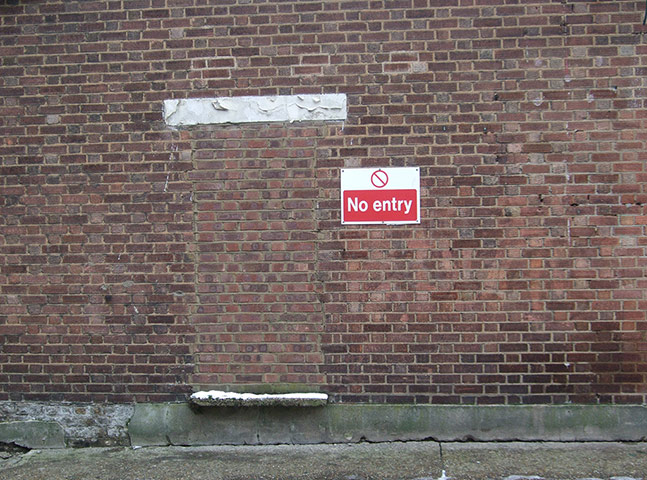 Your Pictures: Signs: A No Entry sign next to a bricked up window