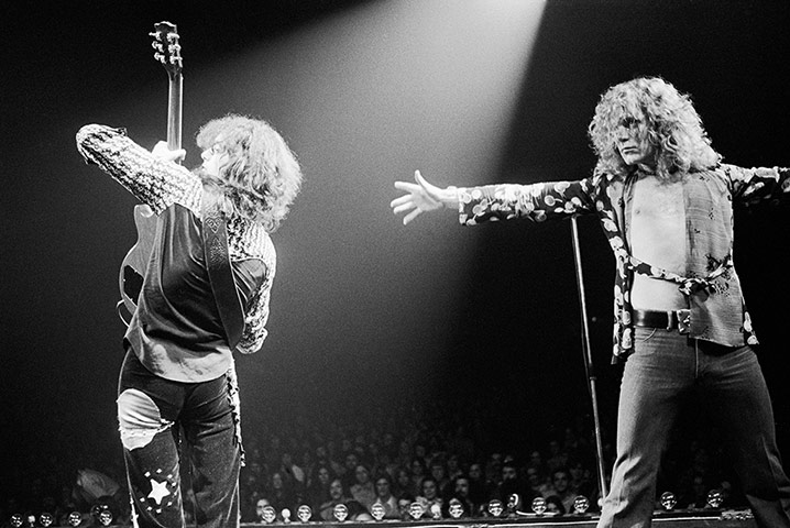 Led Zeppelin: Jimmy Page and Robert Plant on stage in 1975