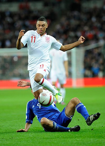Tom England 3: Alex Oxlade-Chamberlain skips over a tackle