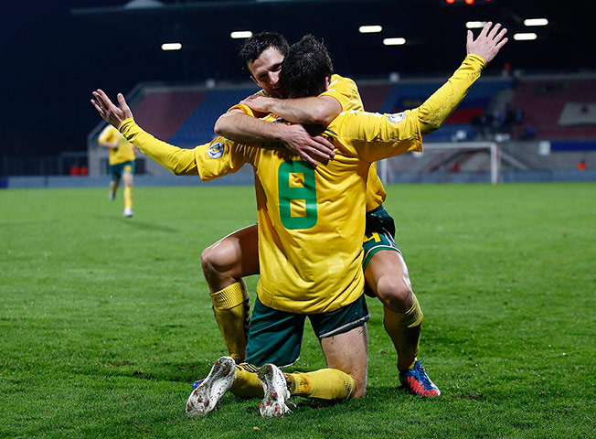 wcq 2: Lithuania's Cesnauskis celebrates with teammate Kijanskas 