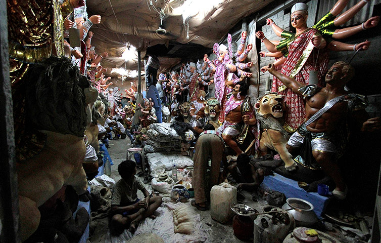 24 hours: Artisans work on idols of Hindu goddess Durga