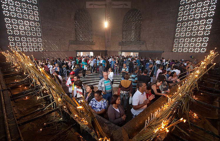 24 hours: aithful light candles at the Basilica of Our Lady of Aparecida