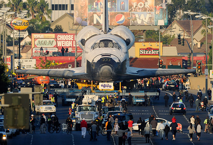 Space Shuttle: The space shuttle Endeavour is transported in convoy to The Forum arena