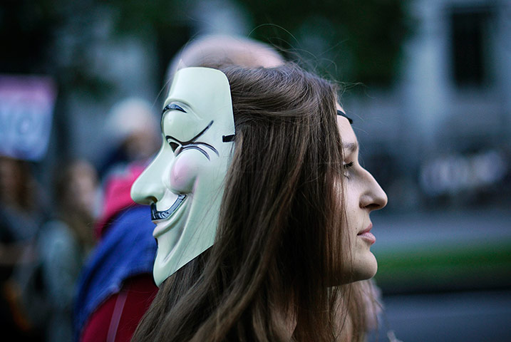 Global Noise Protests: A protester with a Guy Fawkes mask in Madrid