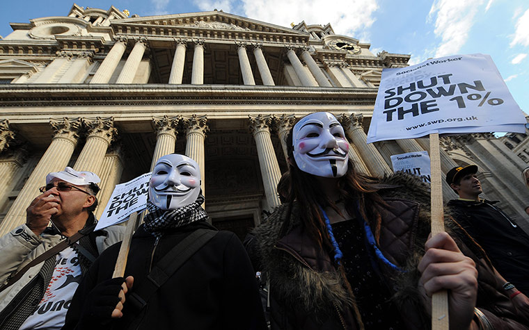 Global Noise Protests: Occupy London protesters hold a rally outside St Paul's Cathedral