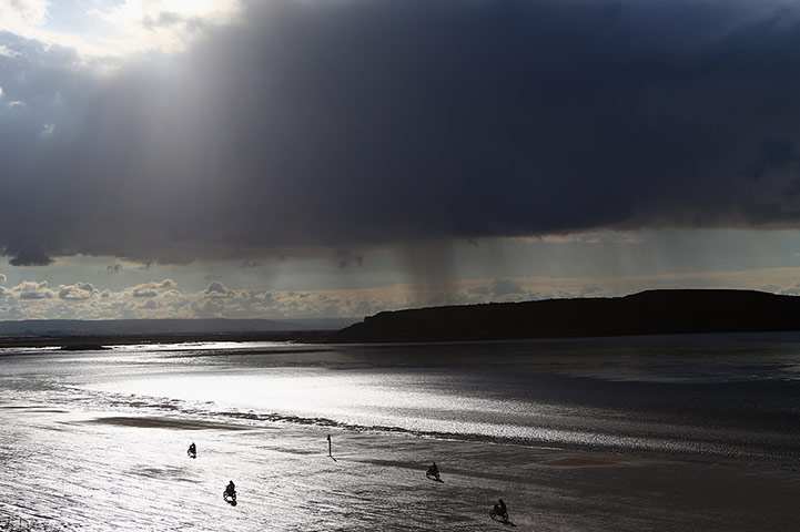 beach race: Competitors speed down the beach 