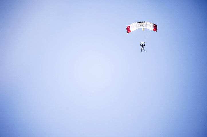 Skydive: Felix Baumgartner comes in to land in the desert in Roswell, New Mexico