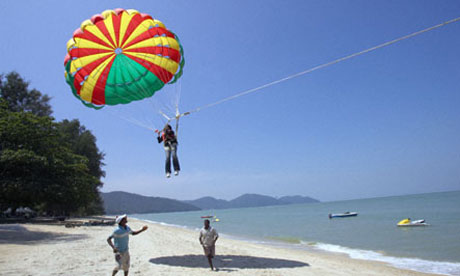 Landing on a beach with a parachute