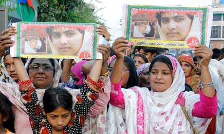 Pakistanis attend a rally condemning the Taliban's attack on Malala Yousafzai