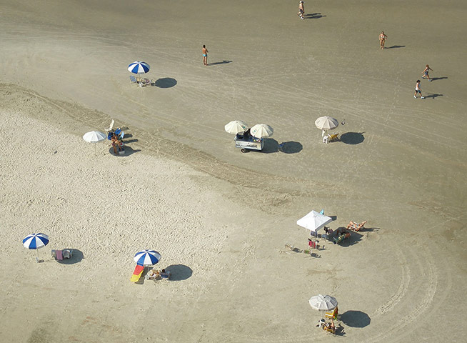 Your Picture: Rhythm: Birds eye view of umbrellas on a beach
