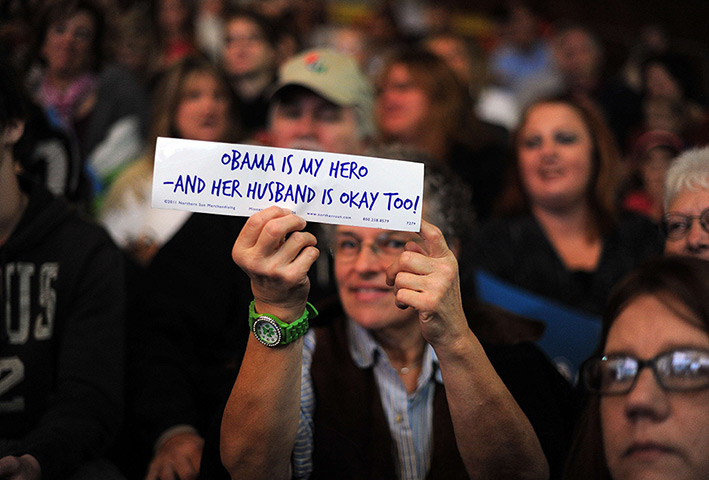 24 hours in pictures: A Michelle Obama supporter holds up a sign