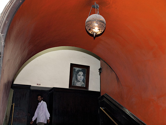 David Bailey's India: A man in an orange archway