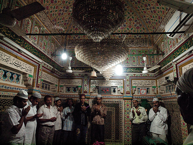 David Bailey's India: Men praying