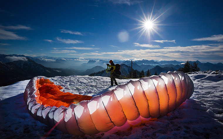 24 hours: Samerberg, Germany: A paraglider prepares for a jump