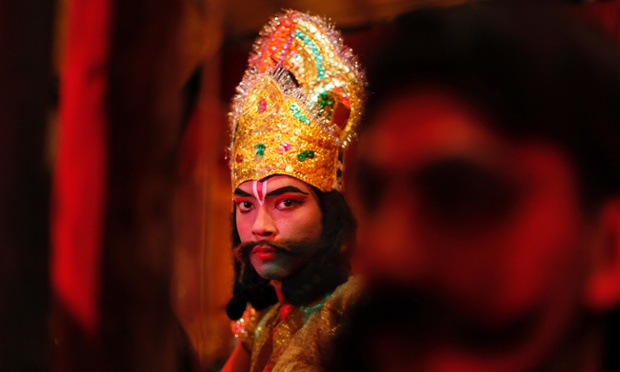 An artist prepares to perform in a traditional Ramleela drama, narrating the life of Hindu god Rama, during celebrations to mark the Dussehra festival in Allahabad, India