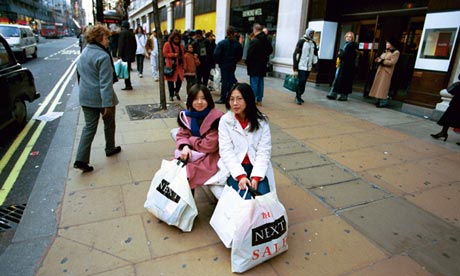 Shoppers rest outside Selfridges