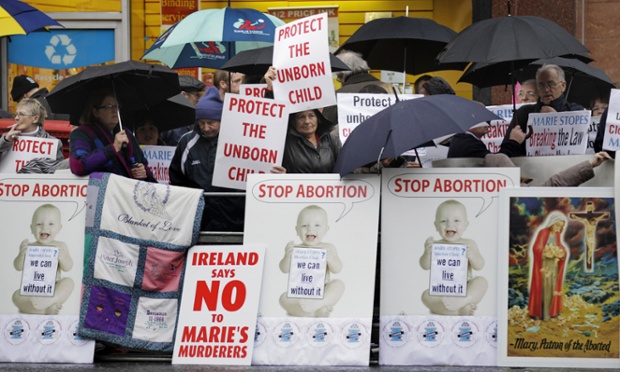 Anti-abortion demonstrators hold placards outside the Marie Stopes clinic in Belfast, Northern Ireland. The first abortion clinic  has opened in Belfast, sparking protests from both the Catholics and Protestants in Northern Ireland.