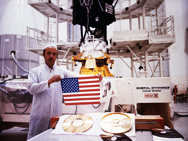 Voyager: NASA Employee Displays Gold-Plated Record to be Placed on Voyager I