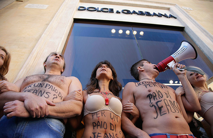 24 hours in pictures: Members of Animalisti Italiani protest in front of a Dolce and Gabbana