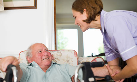 Care Giver at Home of Elderly Man