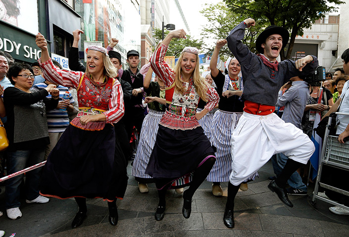 Gangnam style parade: Participants from the Netherlands perform the dance