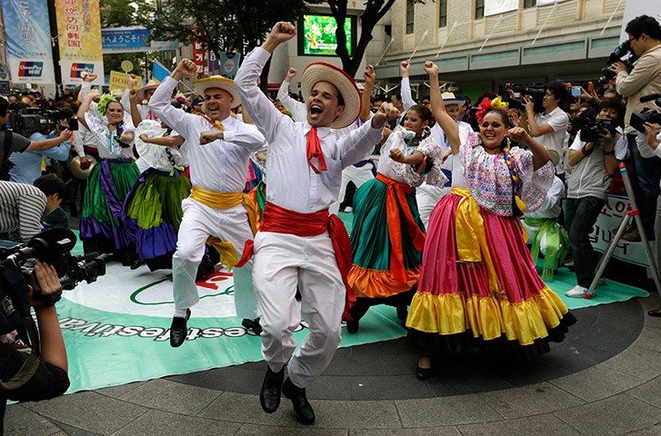 Gangnam style parade: Participants from Costa Rica perform 